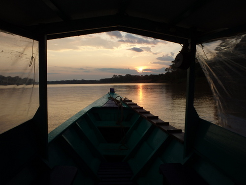 The Sun is rising over the Amazon.